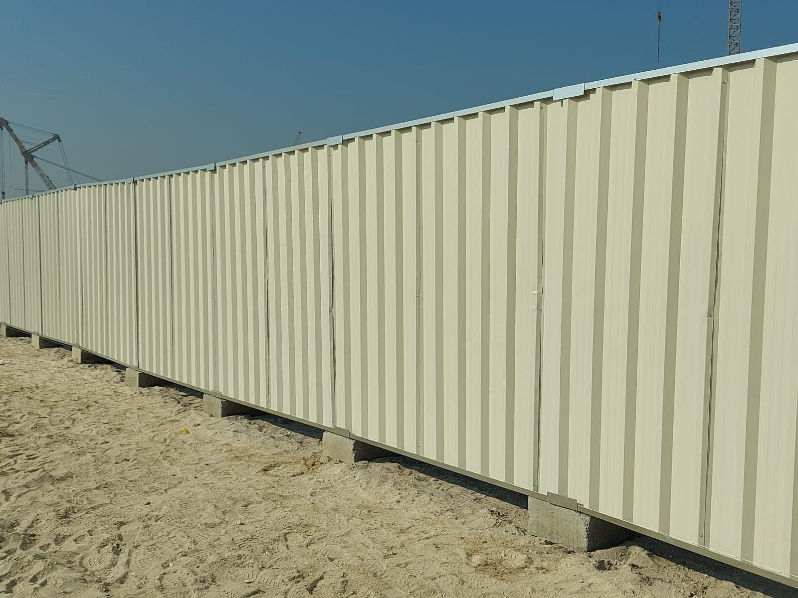 Corrugated metal sheets used for fencing panels and hoardings